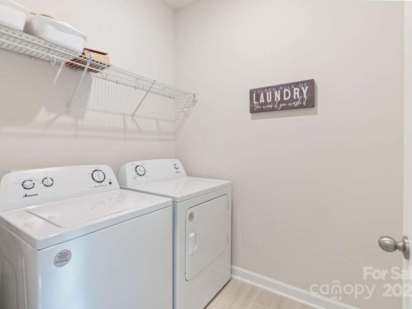 12425 Larue Lane, Huntersville, NC 28078.  MLS# CAR4231476, YatesRealty ID 5604. Main level laundry room