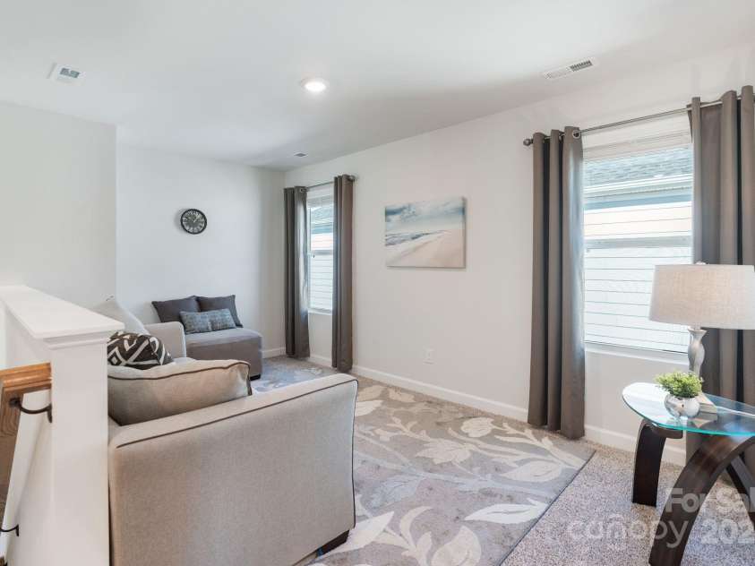 12425 Larue Lane, Huntersville, NC 28078.  MLS# CAR4231476, YatesRealty ID 5604. Versatile loft greets you on the upper level
