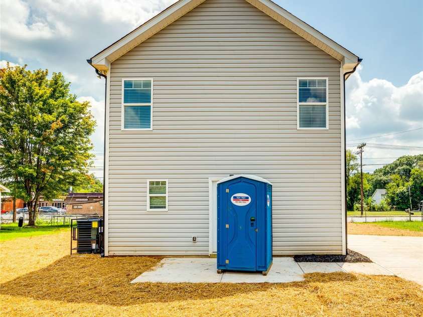 2336 West Boulevard, Charlotte, NC 28208.  MLS# CAR4433409, YatesRealty ID 56044. Back yard before privacy fence was installed