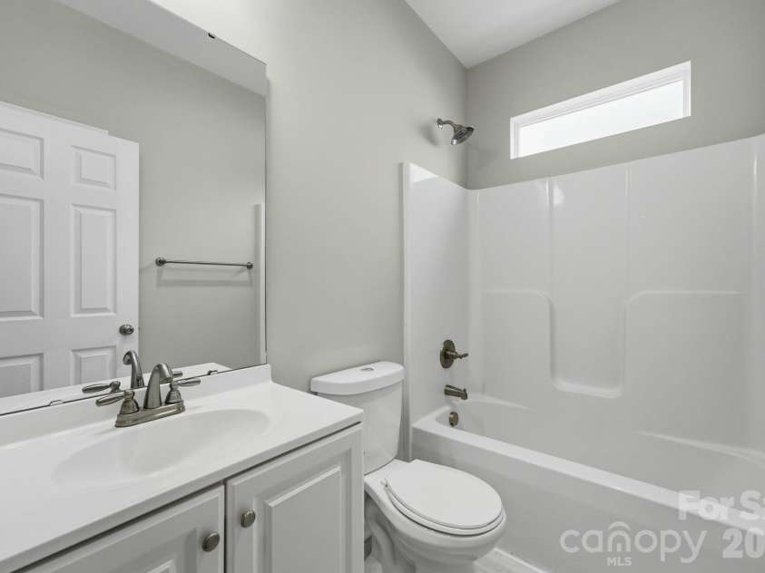 7667 Sarah Drive, Denver, NC 28037.  MLS# CAR4433380, YatesRealty ID 56045. Guest Bathroom