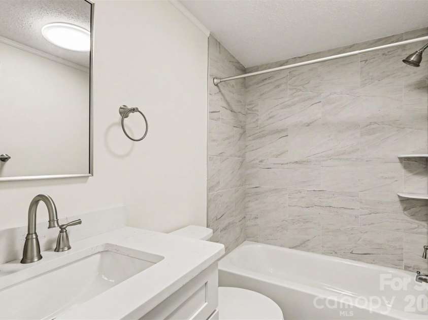 3560 New Potato Drive, Kannapolis, NC 28083.  MLS# CAR4431735, YatesRealty ID 56056. Guest Bathroom