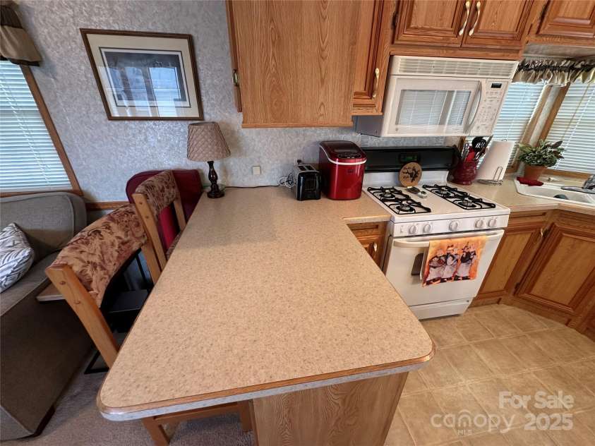 171 Grand View Drive, New London, NC 28127.  MLS# CAR4243912, YatesRealty ID 5606. 