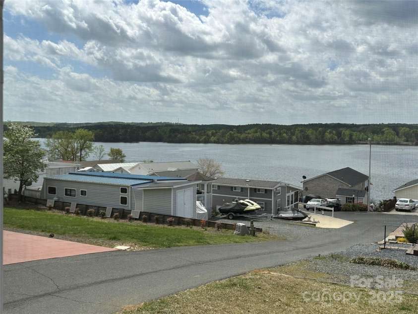 171 Grand View Drive, New London, NC 28127.  MLS# CAR4243912, YatesRealty ID 5606. 