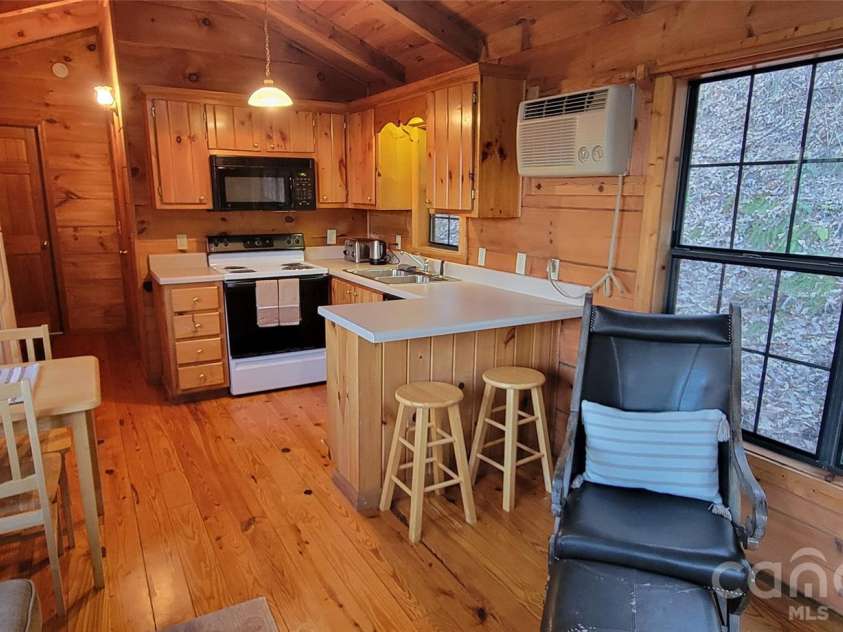 340 Wayah Zooshuga Road, Maggie Valley, NC 28751.  MLS# CAR4432934, YatesRealty ID 56062. 