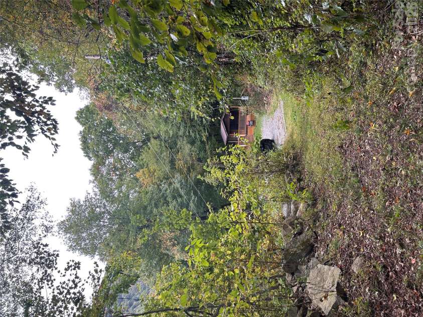 340 Wayah Zooshuga Road, Maggie Valley, NC 28751.  MLS# CAR4432934, YatesRealty ID 56062. 