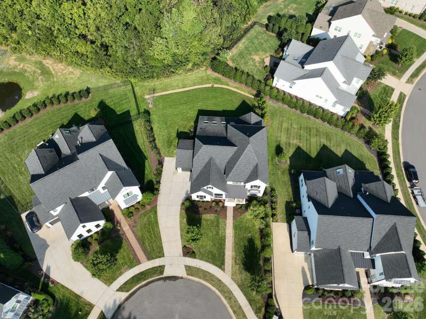 9588 Pacing Lane, Concord, NC 28027.  MLS# CAR4432011, YatesRealty ID 56073. Aerial View of Front and Back