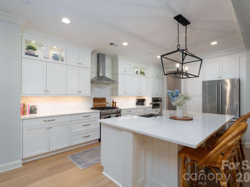 9588 Pacing Lane, Concord, NC 28027.  MLS# CAR4432011, YatesRealty ID 56073. Breakfast Bar with room for 4 Barstools