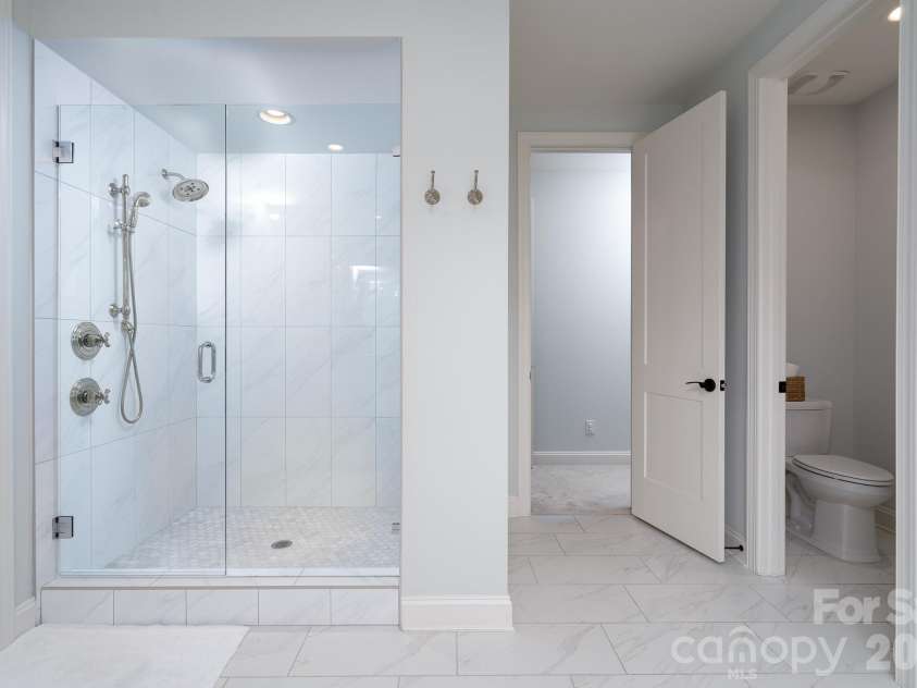 9588 Pacing Lane, Concord, NC 28027.  MLS# CAR4432011, YatesRealty ID 56073. Custom Tile Shower with full Glass wall/Door