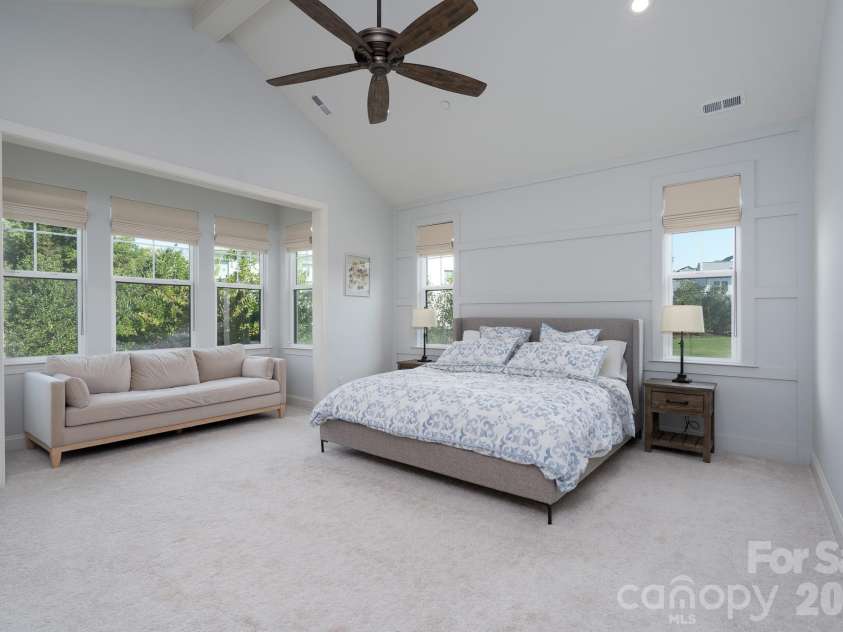 9588 Pacing Lane, Concord, NC 28027.  MLS# CAR4432011, YatesRealty ID 56073. Expanded Primary Suite offers all the room you'll need plus a Sitting area surrounded by windows with view of back yard.