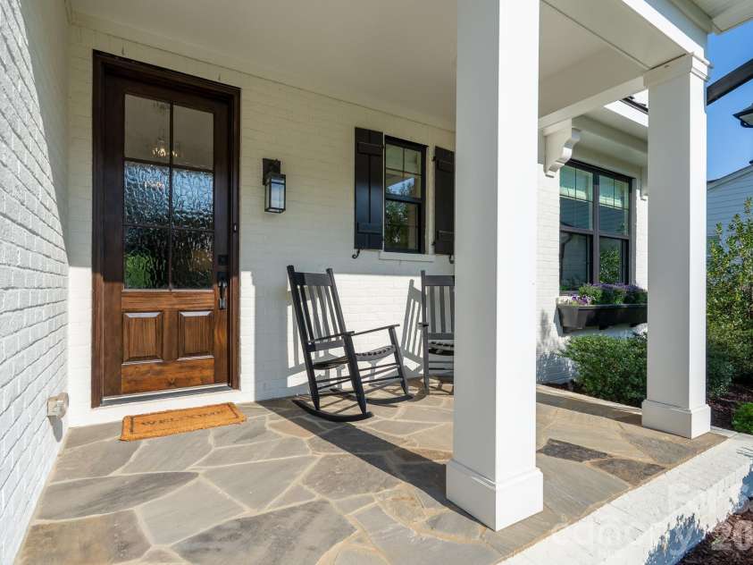 9588 Pacing Lane, Concord, NC 28027.  MLS# CAR4432011, YatesRealty ID 56073. Flagstone front Porch