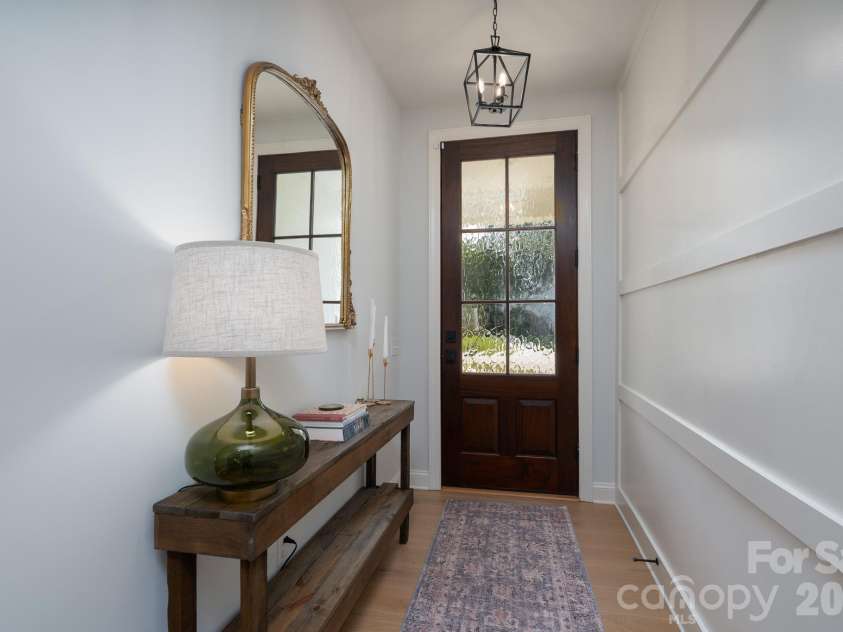 9588 Pacing Lane, Concord, NC 28027.  MLS# CAR4432011, YatesRealty ID 56073. Front Foyer with Solid Wood 6-lite front door