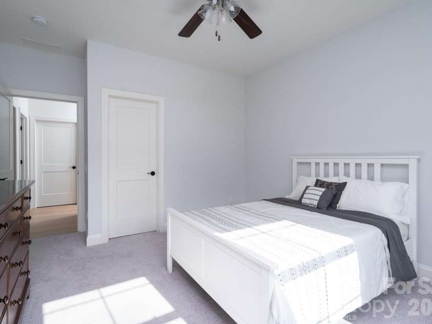 9588 Pacing Lane, Concord, NC 28027.  MLS# CAR4432011, YatesRealty ID 56073. Large guest Bedroom with spacious walk-in Closet