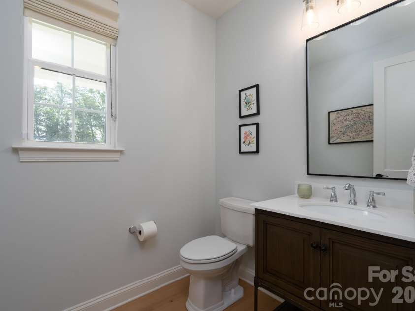 9588 Pacing Lane, Concord, NC 28027.  MLS# CAR4432011, YatesRealty ID 56073. Main floor guest half bath