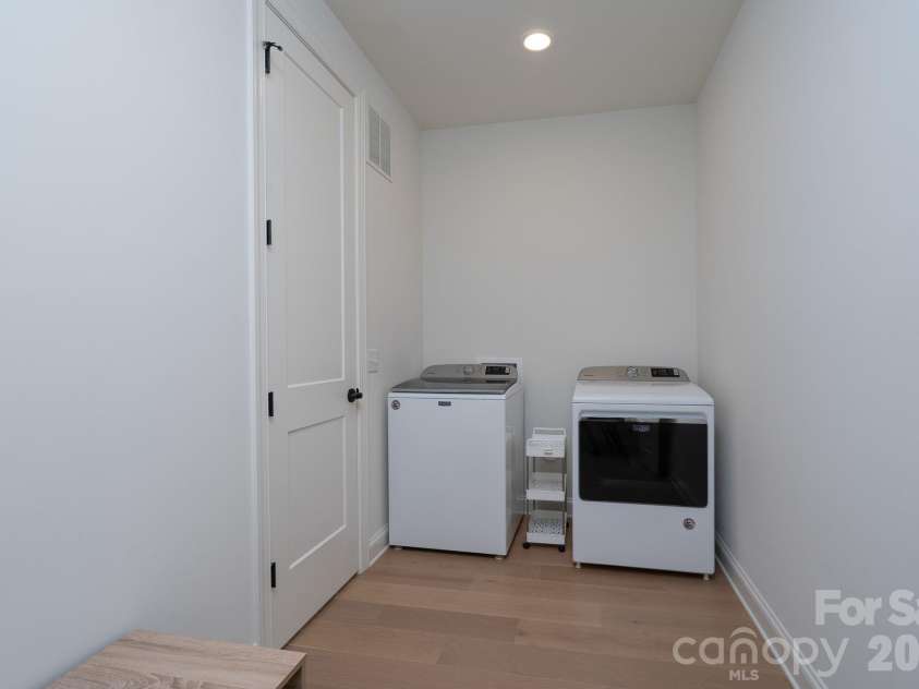 9588 Pacing Lane, Concord, NC 28027.  MLS# CAR4432011, YatesRealty ID 56073. Main floor Laundry - Comes with Washer and Dryer