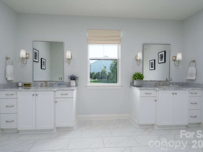 9588 Pacing Lane, Concord, NC 28027.  MLS# CAR4432011, YatesRealty ID 56073. Primary Bathroom offers separate Vanities with Marble counters