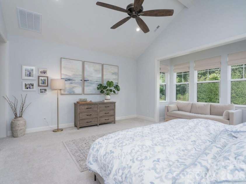 9588 Pacing Lane, Concord, NC 28027.  MLS# CAR4432011, YatesRealty ID 56073. Primary bedroom with digitally enhanced decor.