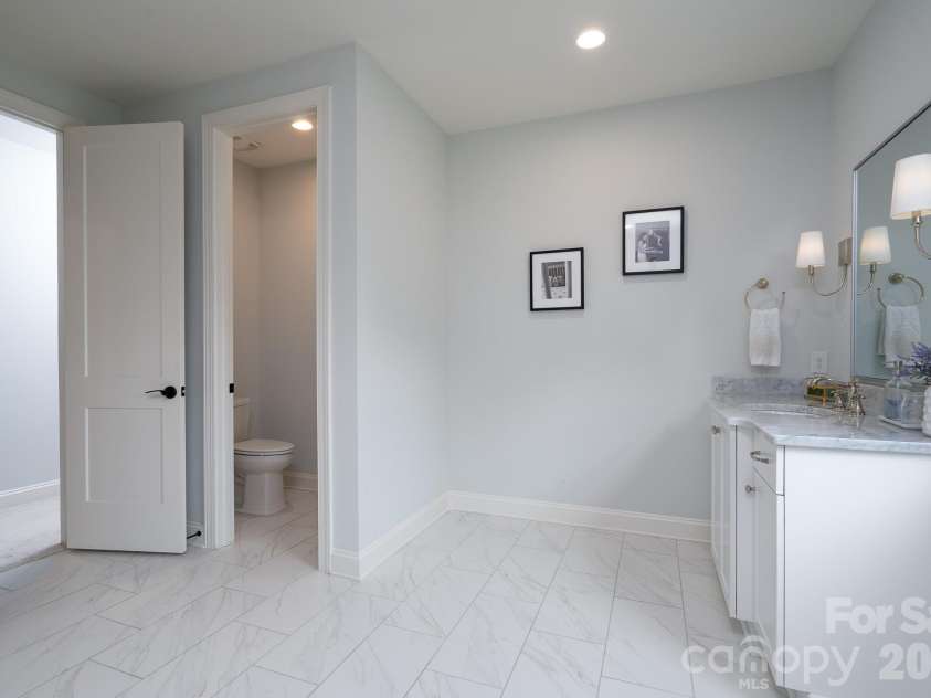 9588 Pacing Lane, Concord, NC 28027.  MLS# CAR4432011, YatesRealty ID 56073. Private restroom off Primary bath.