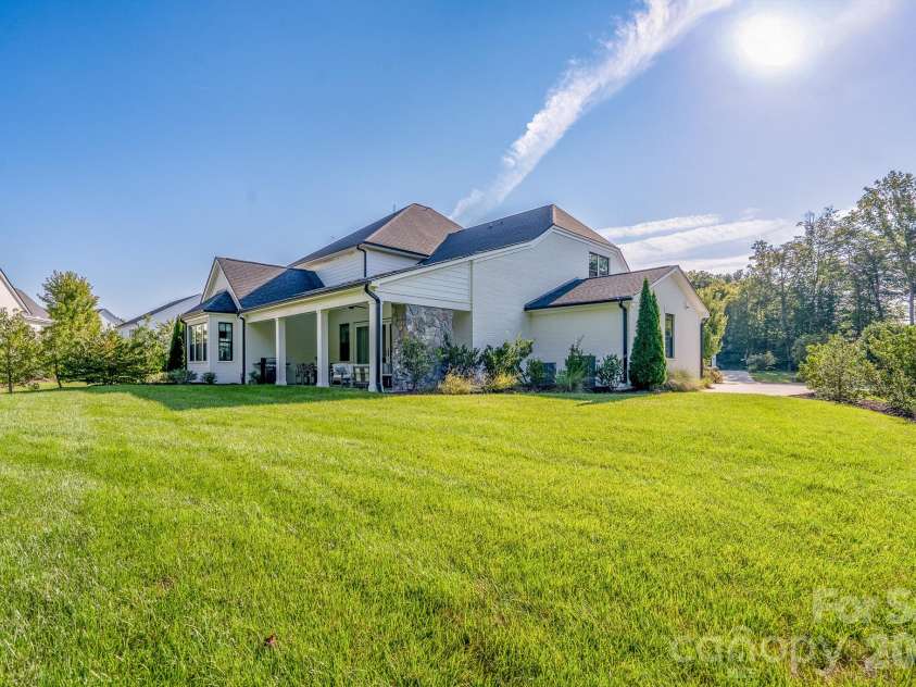 9588 Pacing Lane, Concord, NC 28027.  MLS# CAR4432011, YatesRealty ID 56073. Wonderful large level back yard to enjoy