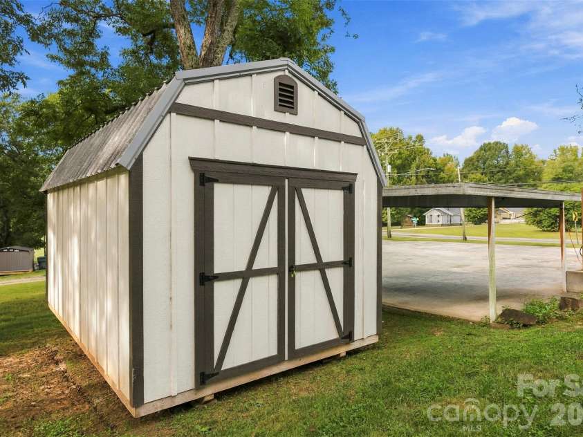 2832 Beaty Road, Gastonia, NC 28056.  MLS# CAR4433204, YatesRealty ID 56076. Storage Building located at driveway