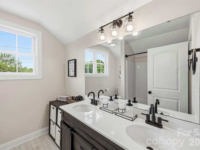 2832 Beaty Road, Gastonia, NC 28056.  MLS# CAR4433204, YatesRealty ID 56076. Upstairs Full Bath w/ Dual Vanity