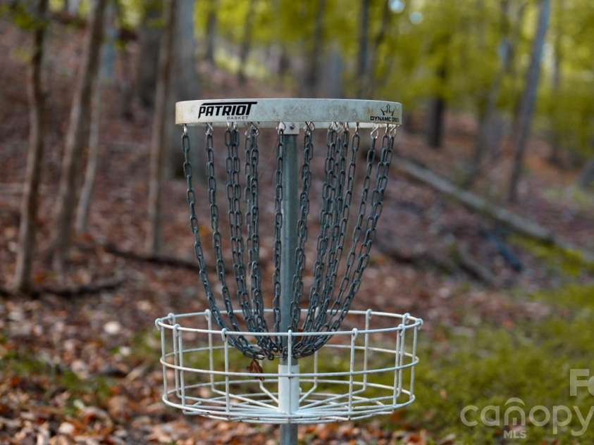 717 Fredricksburg Road, Matthews, NC 28105.  MLS# CAR4428487, YatesRealty ID 56079. Community disc golf