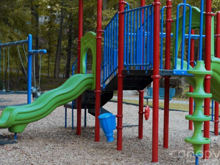 717 Fredricksburg Road, Matthews, NC 28105.  MLS# CAR4428487, YatesRealty ID 56079. Community playground