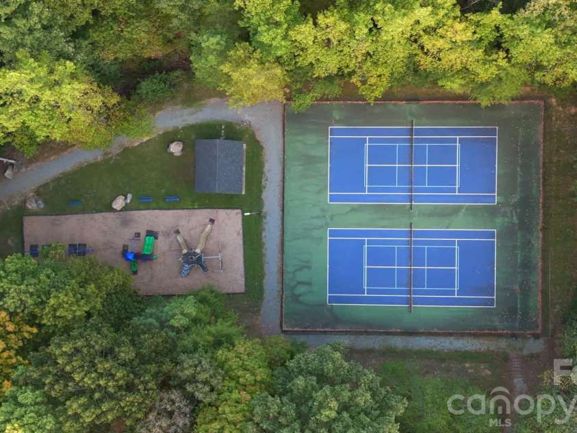 717 Fredricksburg Road, Matthews, NC 28105.  MLS# CAR4428487, YatesRealty ID 56079. Community tennis/pickleball courts