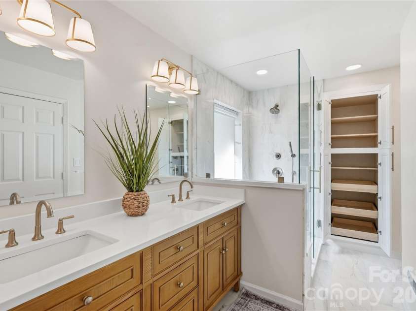 717 Fredricksburg Road, Matthews, NC 28105.  MLS# CAR4428487, YatesRealty ID 56079. Completely renovated with deep linen closet built-in featuring pull-out drawers