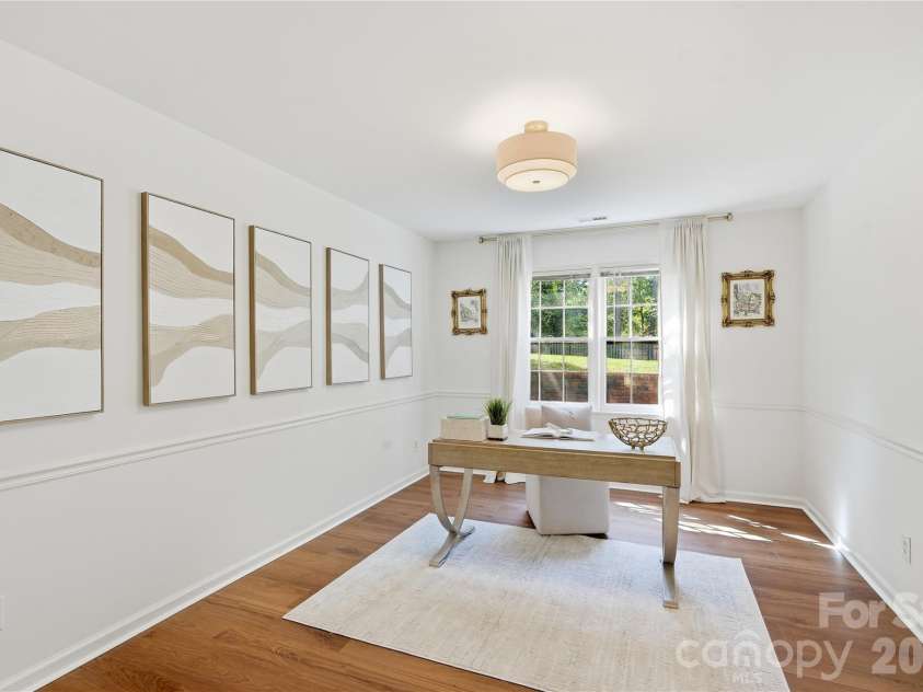 717 Fredricksburg Road, Matthews, NC 28105.  MLS# CAR4428487, YatesRealty ID 56079. Main floor office that can also double as a formal dining space