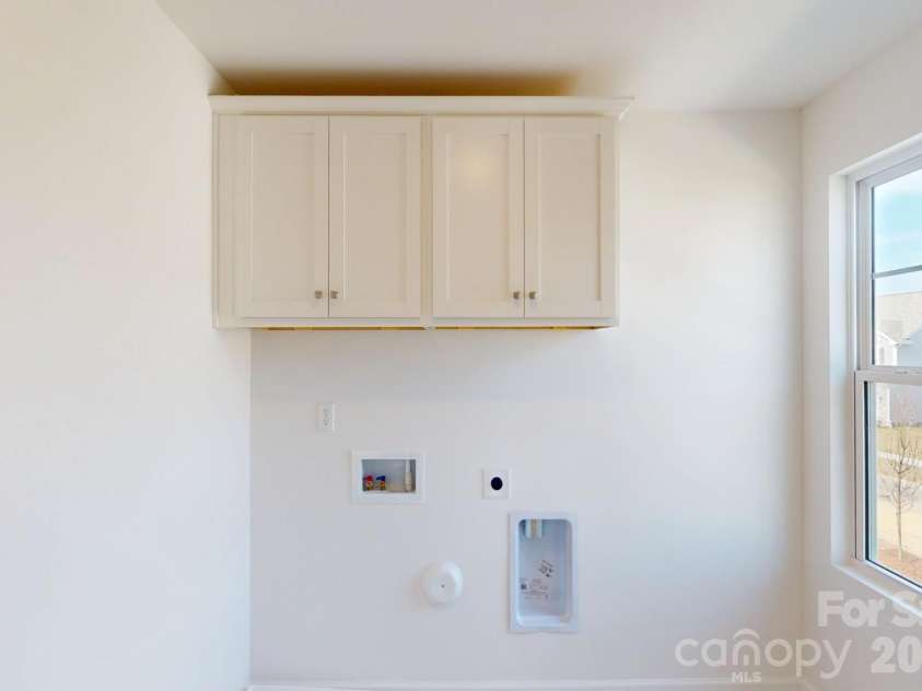 920 Barker Street, Monroe, NC 28112.  MLS# CAR4315513, YatesRealty ID 5608. Laundry room