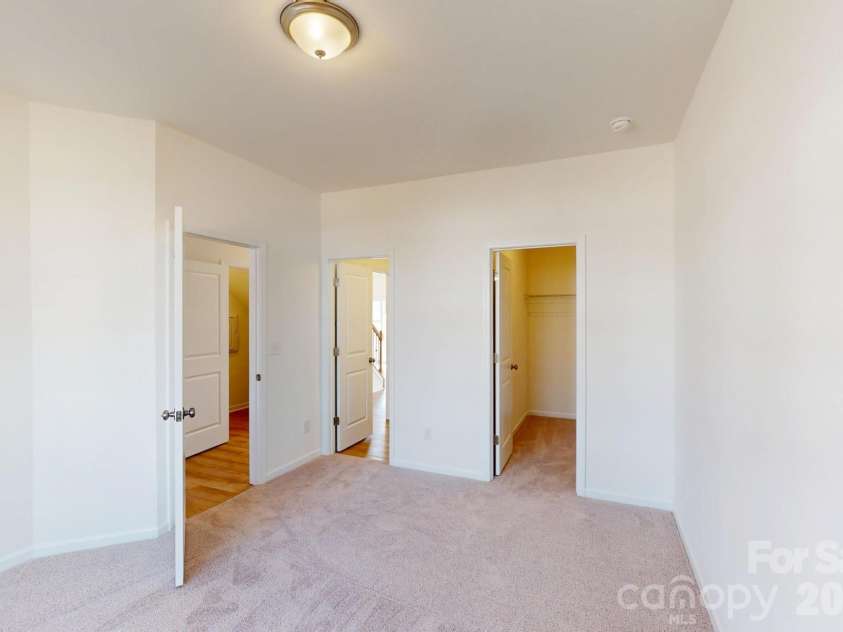 920 Barker Street, Monroe, NC 28112.  MLS# CAR4315513, YatesRealty ID 5608. Main level bedroom