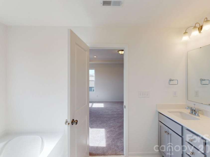 920 Barker Street, Monroe, NC 28112.  MLS# CAR4315513, YatesRealty ID 5608. Owner's bathroom