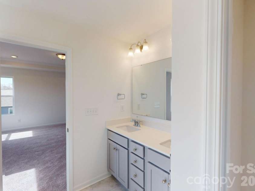 920 Barker Street, Monroe, NC 28112.  MLS# CAR4315513, YatesRealty ID 5608. Owner's bathroom