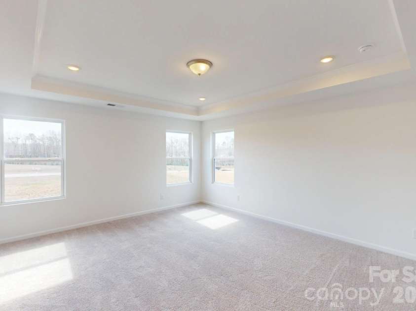 920 Barker Street, Monroe, NC 28112.  MLS# CAR4315513, YatesRealty ID 5608. Owner's bedroom