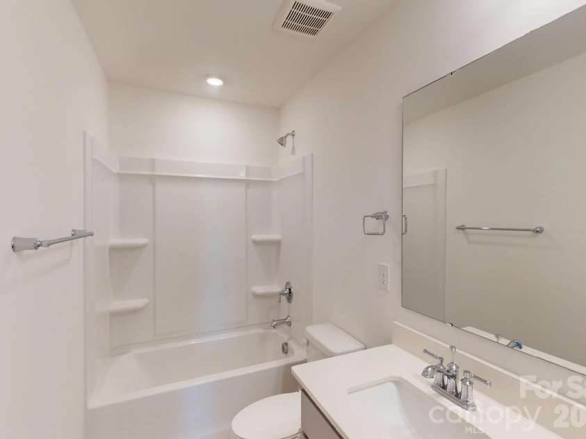 920 Barker Street, Monroe, NC 28112.  MLS# CAR4315513, YatesRealty ID 5608. Secondary bathroom