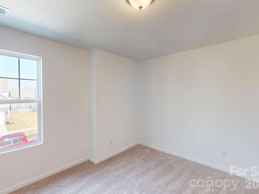 920 Barker Street, Monroe, NC 28112.  MLS# CAR4315513, YatesRealty ID 5608. Secondary bedroom