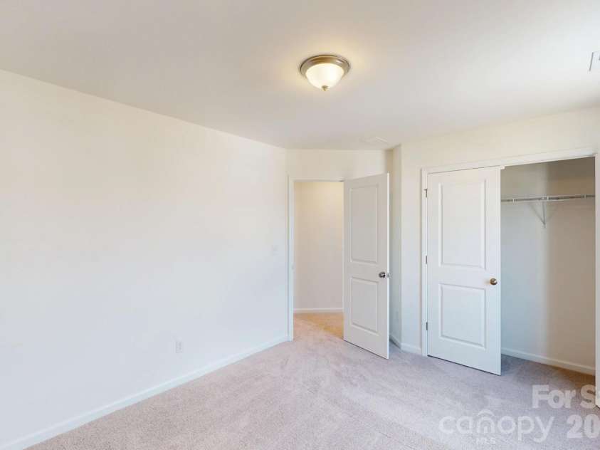 920 Barker Street, Monroe, NC 28112.  MLS# CAR4315513, YatesRealty ID 5608. Secondary bedroom