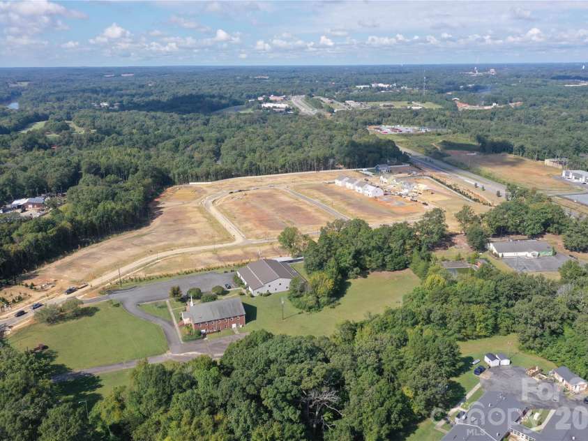 920 Barker Street, Monroe, NC 28112.  MLS# CAR4315513, YatesRealty ID 5608. Sky view of community