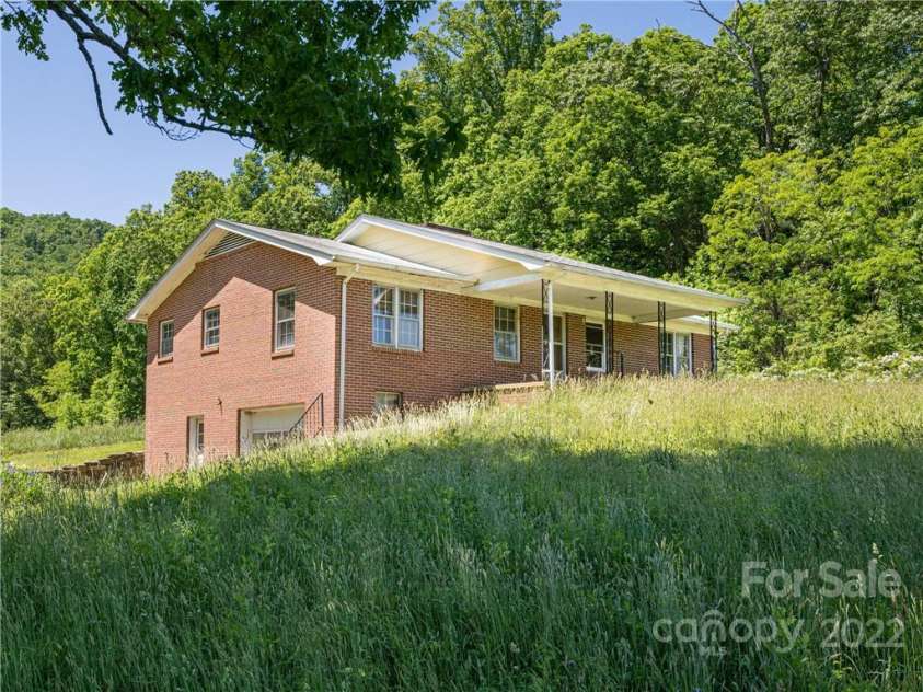 99999 Merrills Cove Road, Asheville, NC 28803.  MLS# CAR3918824, YatesRealty ID 561. 