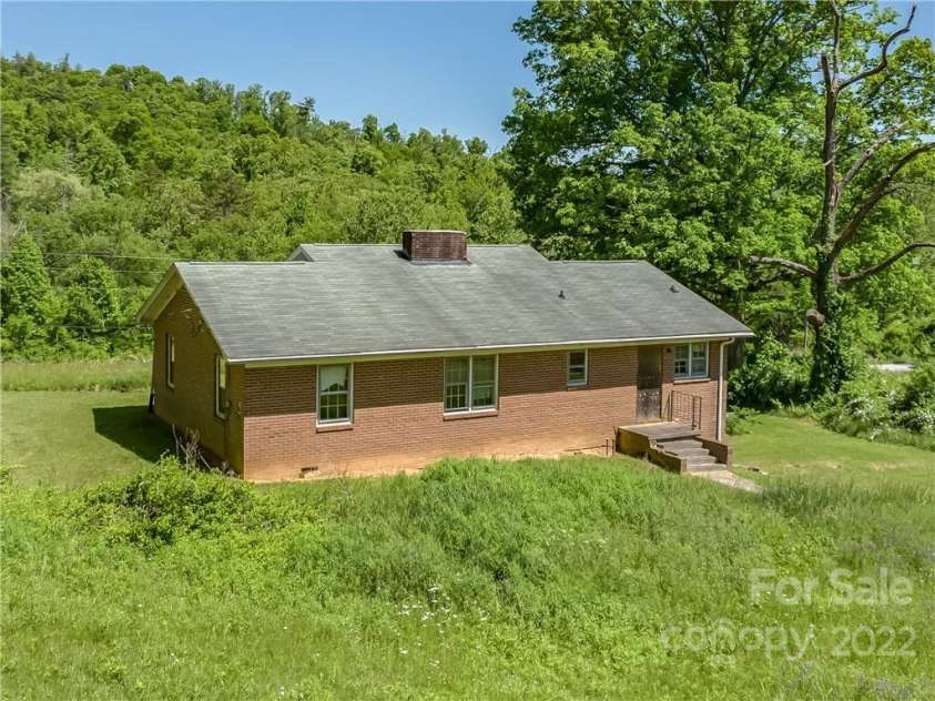 99999 Merrills Cove Road, Asheville, NC 28803.  MLS# CAR3918824, YatesRealty ID 561. 