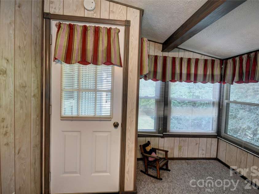 134 Raven Ridge, Maggie Valley, NC 28751.  MLS# CAR4249162, YatesRealty ID 5610. Rear entry/exit from the sunroom