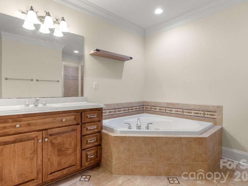 1221 Silver Arrow Court, Fort Mill, SC 29715.  MLS# CAR4348866, YatesRealty ID 5611. Guest Bathroom - Basement 