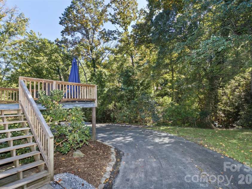 2911 Middleton Place, Hendersonville, NC 28791.  MLS# CAR4433070, YatesRealty ID 56111. Back Deck looking with creek along the back