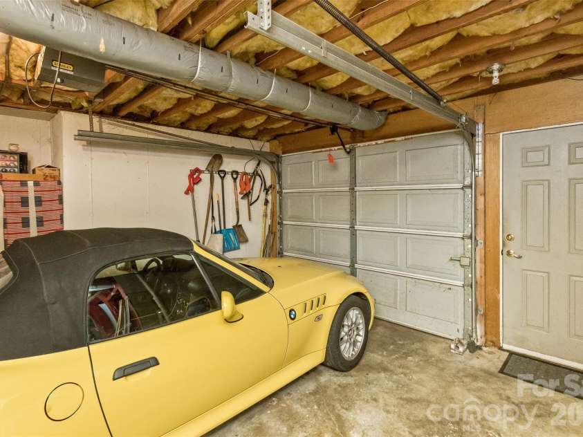 2911 Middleton Place, Hendersonville, NC 28791.  MLS# CAR4433070, YatesRealty ID 56111. Basement Garage