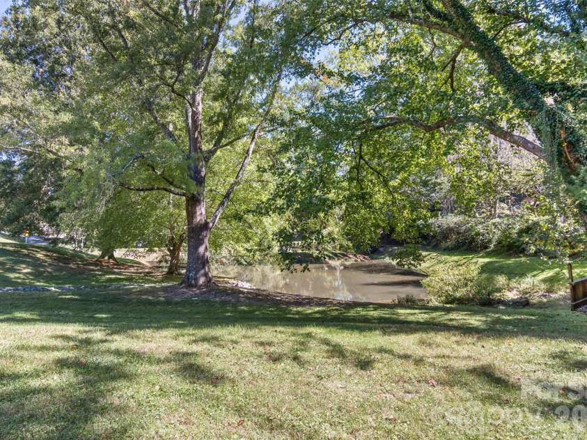 2911 Middleton Place, Hendersonville, NC 28791.  MLS# CAR4433070, YatesRealty ID 56111. Community Pond Area
