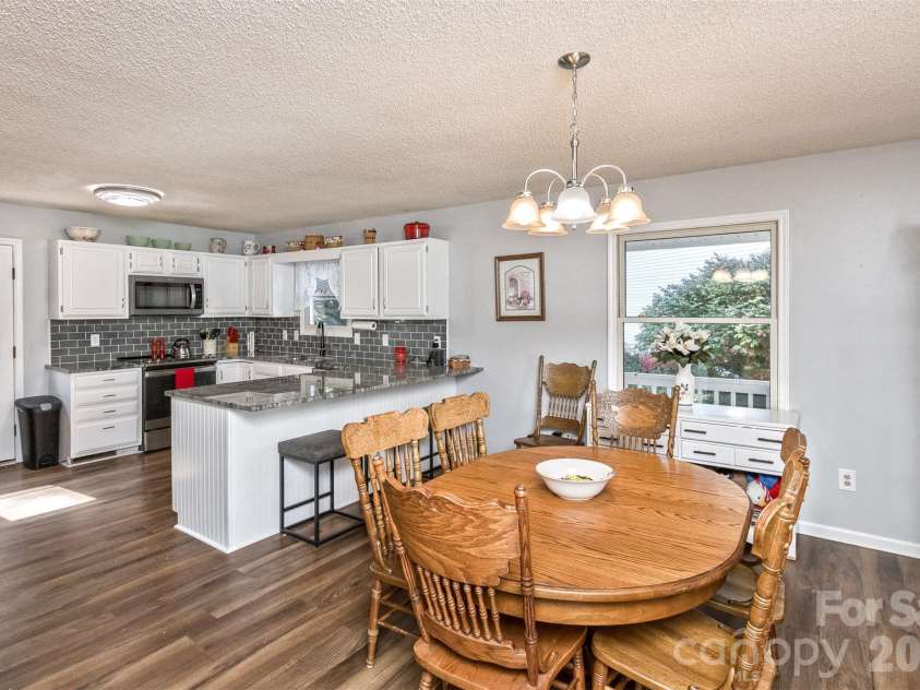 2911 Middleton Place, Hendersonville, NC 28791.  MLS# CAR4433070, YatesRealty ID 56111. Dining Area looking into Kitchen