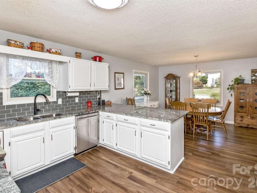 2911 Middleton Place, Hendersonville, NC 28791.  MLS# CAR4433070, YatesRealty ID 56111. Kitchen looking into dining Area