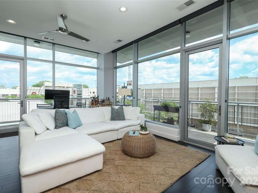 1100 Metropolitan Avenue, Charlotte, NC 28204.  MLS# CAR4241116, YatesRealty ID 5612. All windows have roller shades
