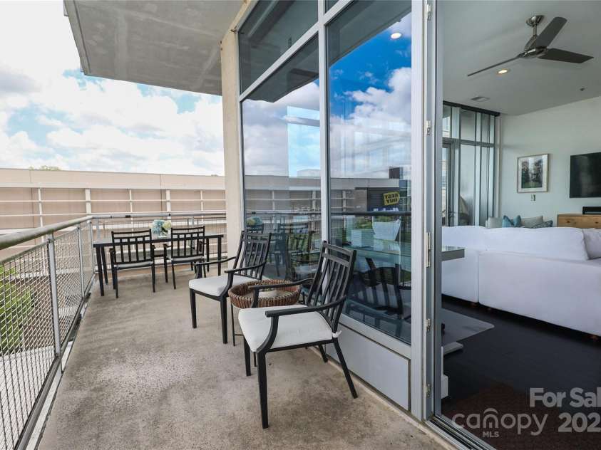 1100 Metropolitan Avenue, Charlotte, NC 28204.  MLS# CAR4241116, YatesRealty ID 5612. Rare corner unit with wrap around porches