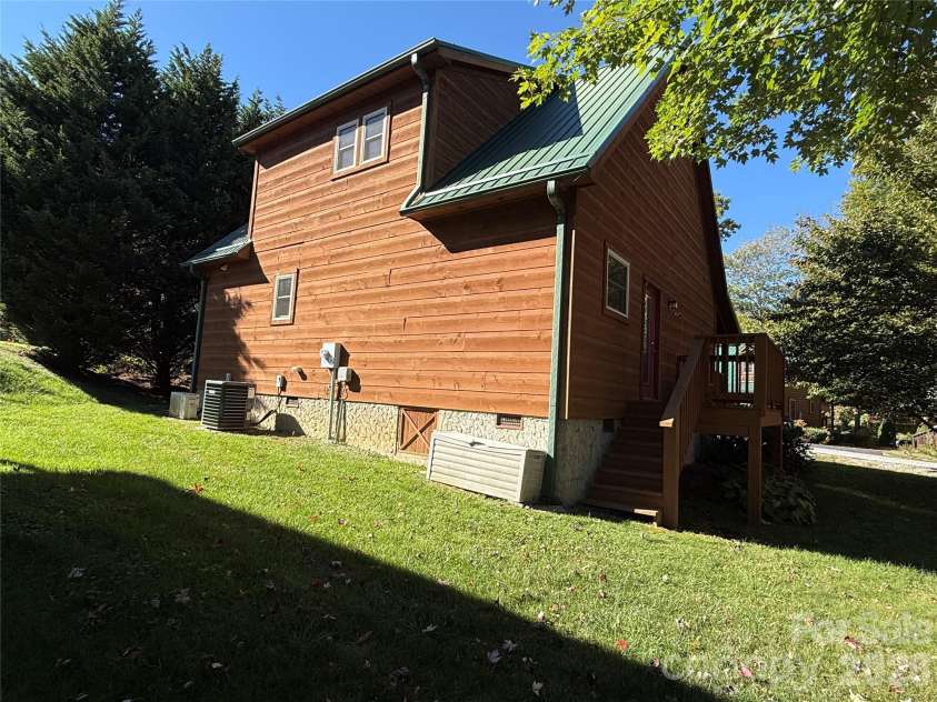 588 Panoramic Loop, Maggie Valley, NC 28751.  MLS# CAR4431380, YatesRealty ID 56124. Back of the house - and side yard deck